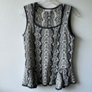 CAbi sweater fit and flare size Medium gray and cream ruffled bottom